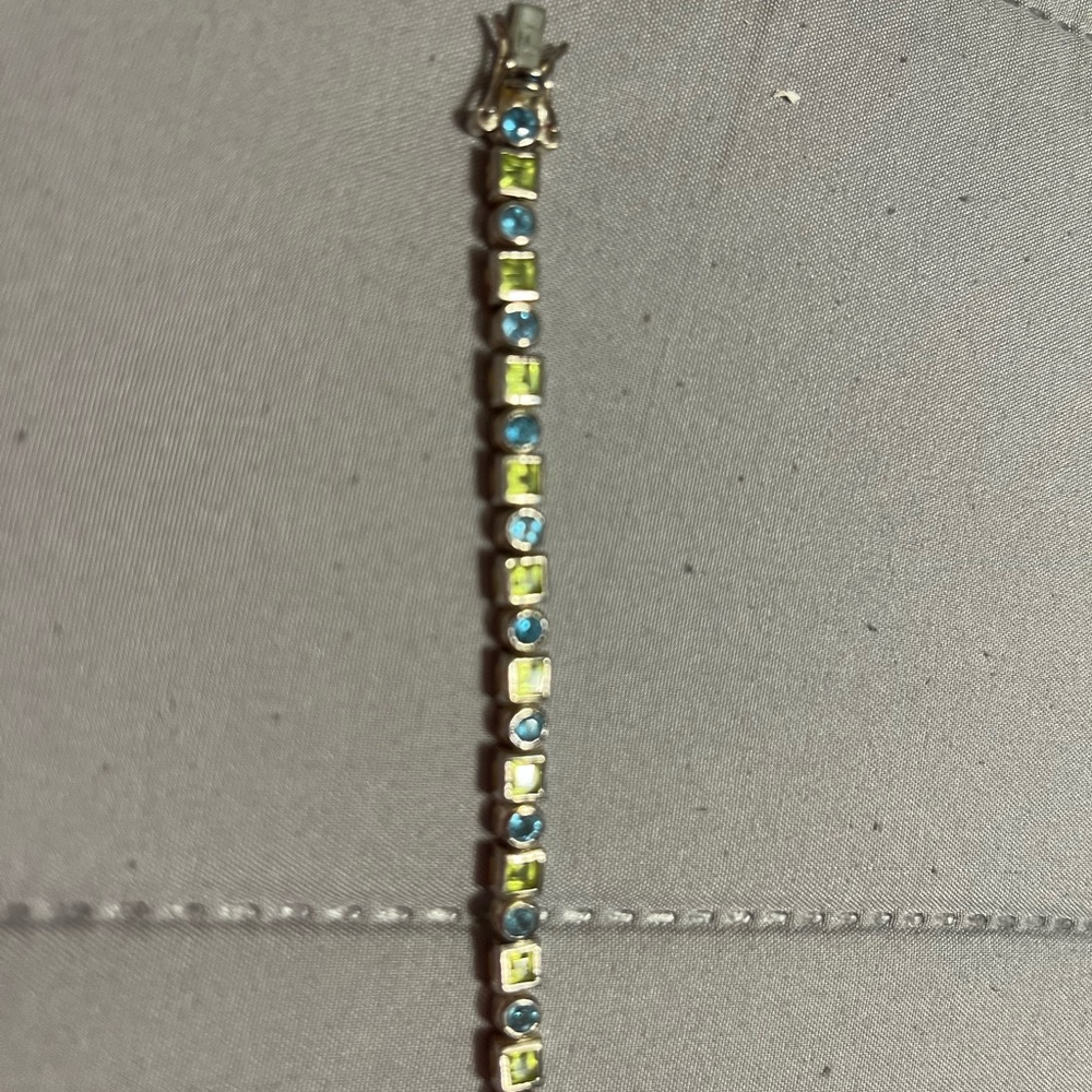 Elegant Blue and Green Bracelet with Prong Set Stones